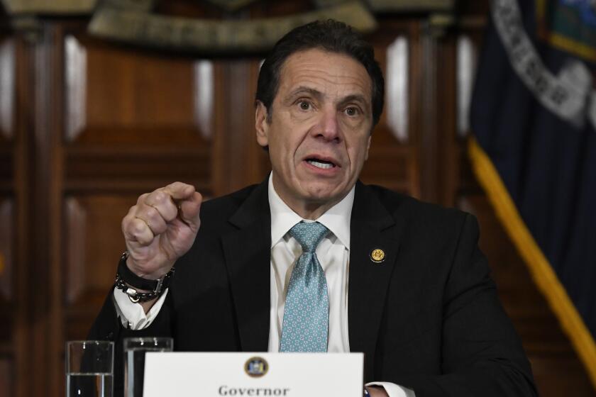 FILE- In this Jan. 29, 2019 file photo, New York Gov. Andrew Cuomo holds a news conference in the Red Room at the state Capitol in Albany, N.Y. Cuomo says he's directing state health officials to ban the sale of flavored e-cigarettes, citing the risk of young people getting addicted to nicotine. The Democrat announced Sunday, Sept. 15 that the state health commissioner would be making a recommendation this week to the state Public Health and Health Planning Council. (AP Photo/Hans Pennink, File)