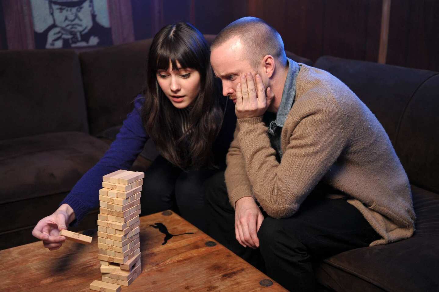 "Smashed" stars Mary Elizabeth Winstead and Aaron Paul, who also stars in the TV series "Breaking Bad," play games at the Puma Social Lounge.