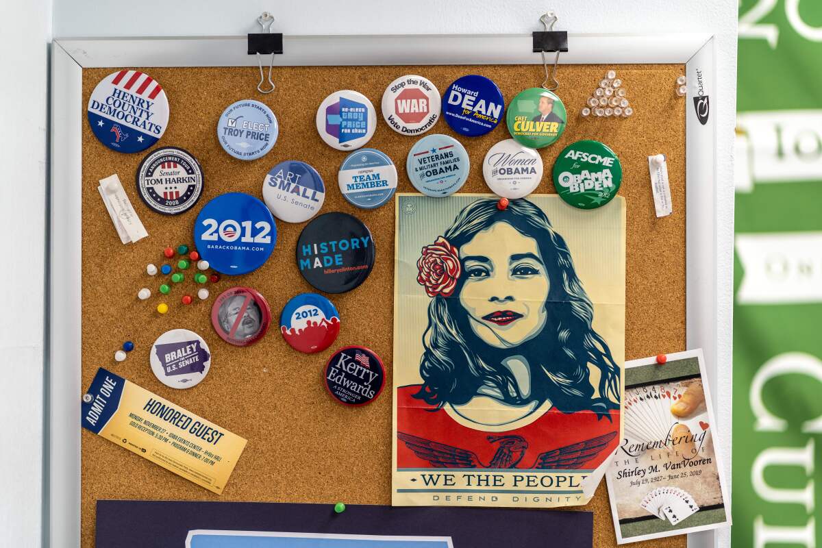 A collection of pins from different campaigns at Iowa Democratic Party Chairman Troy Price's office in Des Moines.