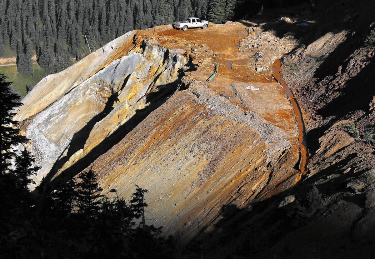 Toxic wastewater flows from the Gold King Mine near Silverton, Colo., on Aug. 13.