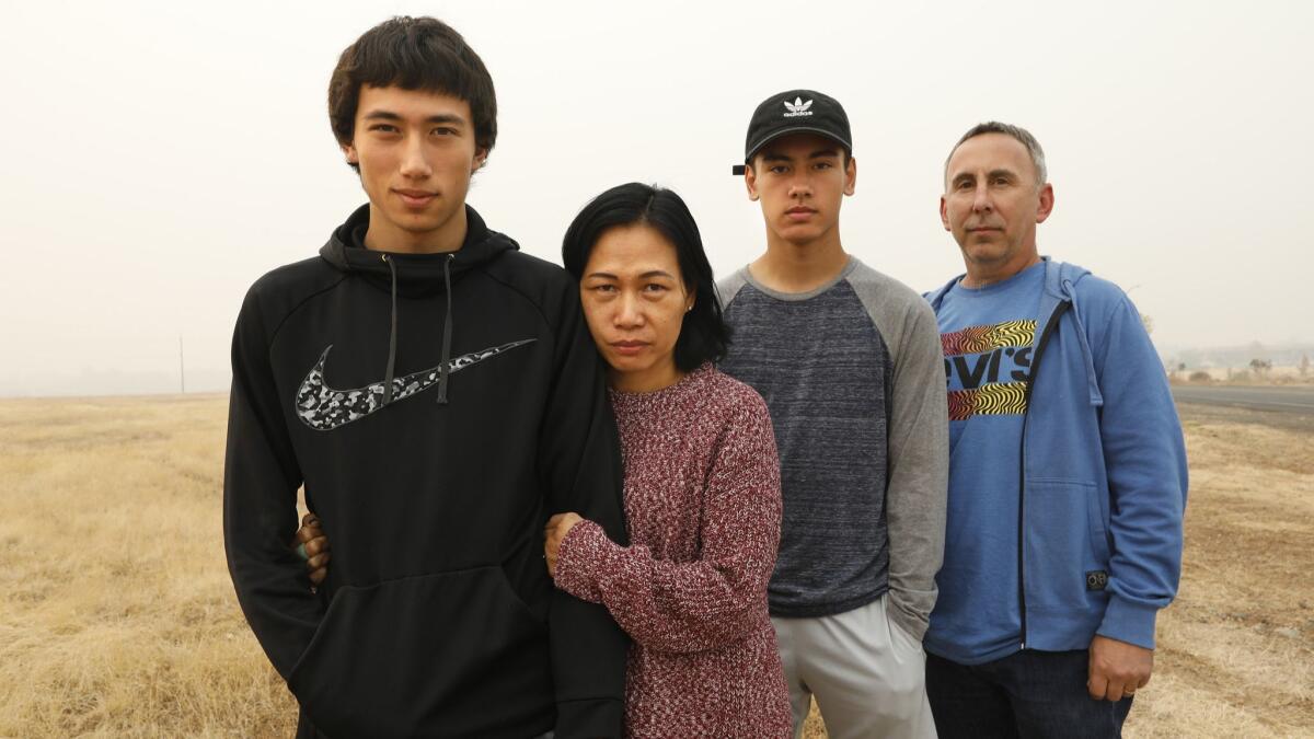 The Weldon family lost their home when the Camp fire burned through their neighborhood. They are now staying with relatives in Chico. From left is Jacob Weldon, 17; his mother, Ellen; his brother Ben, 16; and father Michael.