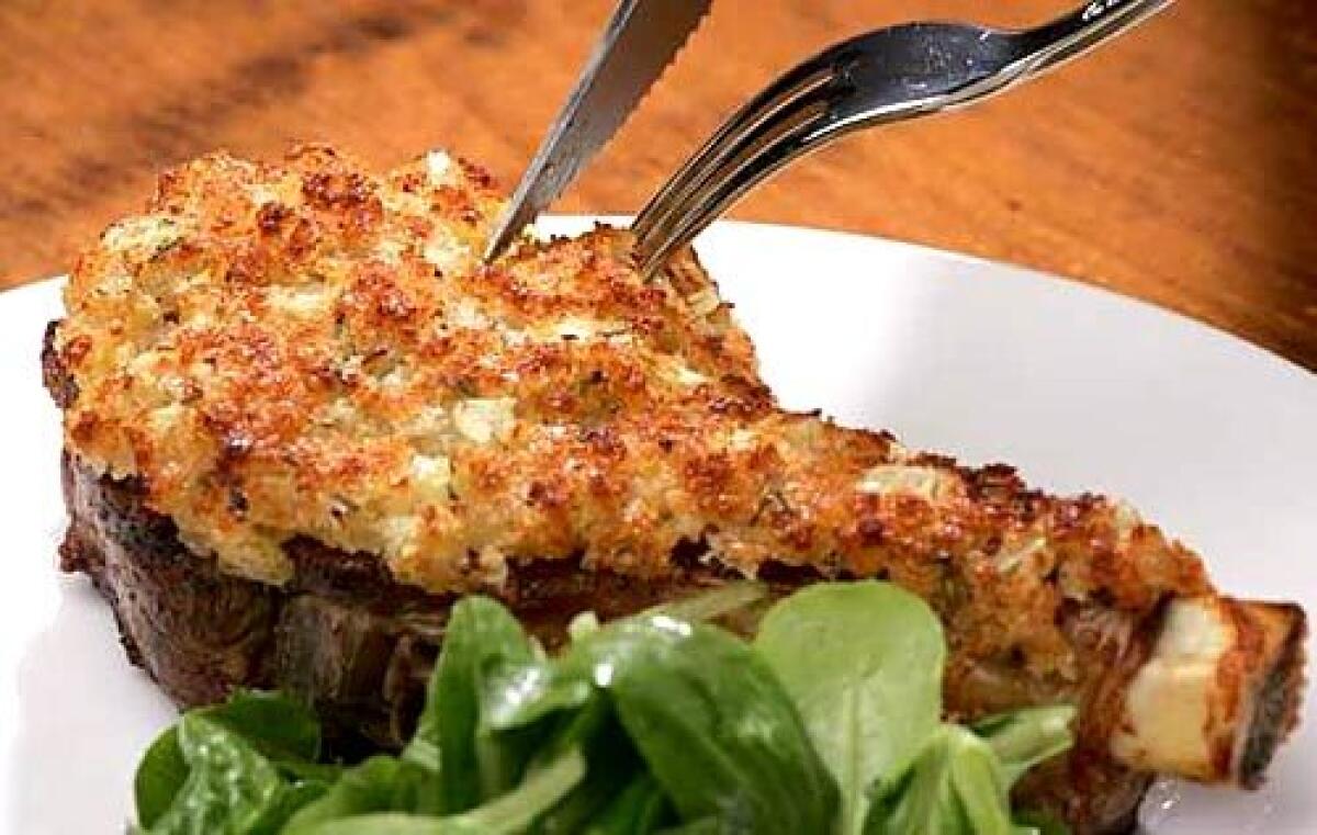 Rosemary-Parmesan crusted veal chops are rich with butter.