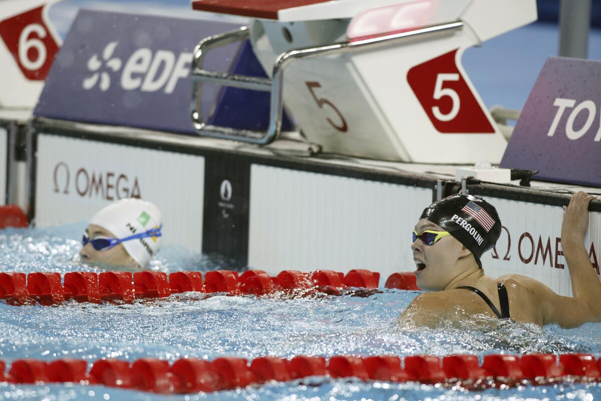 American Gia Pergolini looks up after winning the gold medal in the S13 100-meter backstroke at the Paralympic Games 