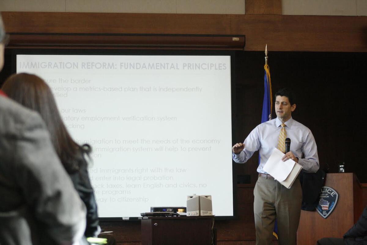 Rep. Paul Ryan (R-Wis.) answers a question at a town hall meeting March 18 in Franklin, Wis.