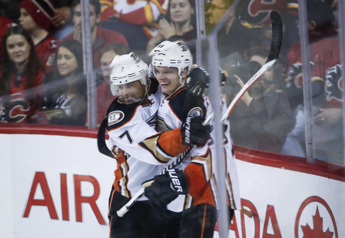 Ducks' Jakob Silfverberg, right, celebrates his goal against the Calgary Flames with Andrew Cogliano during the third period on Dec. 29.