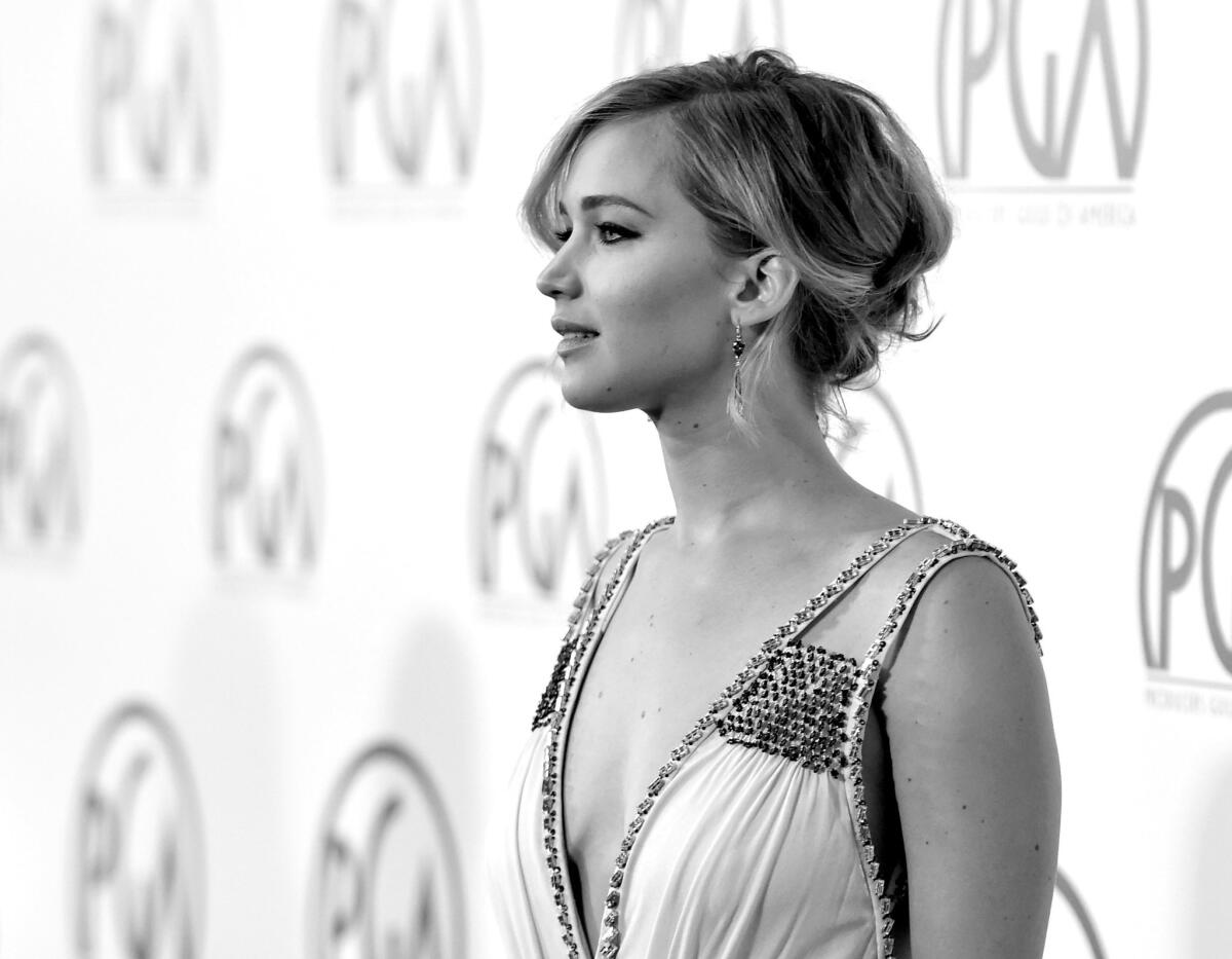 Jennifer Lawrence is attached to star in "It's What I Do" as a photojournalist, with Steven Spielberg directing.