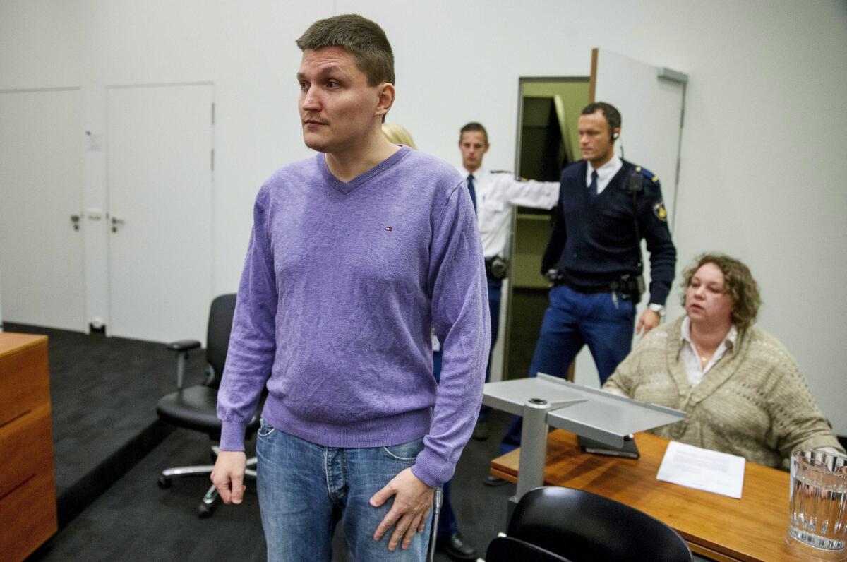 Accused Russian Hacker Vladimir Drinkman fights his extradition to the United States in a Dutch court in January.