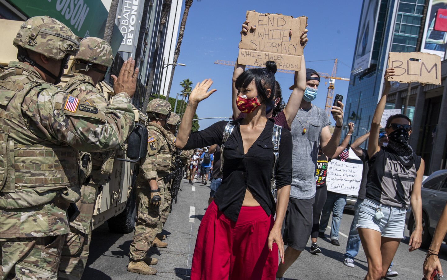 Over 1,000 protesters are met by police in Hollywood - Los Angeles Times