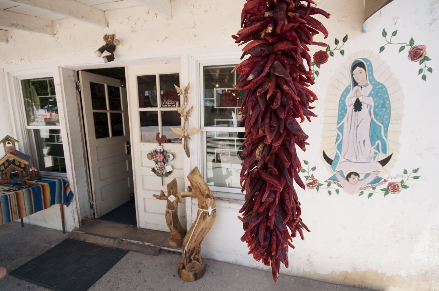 Red chile, shown here at Potrero Trading Post, marks the landscape in the village of Chimayó, N.M.