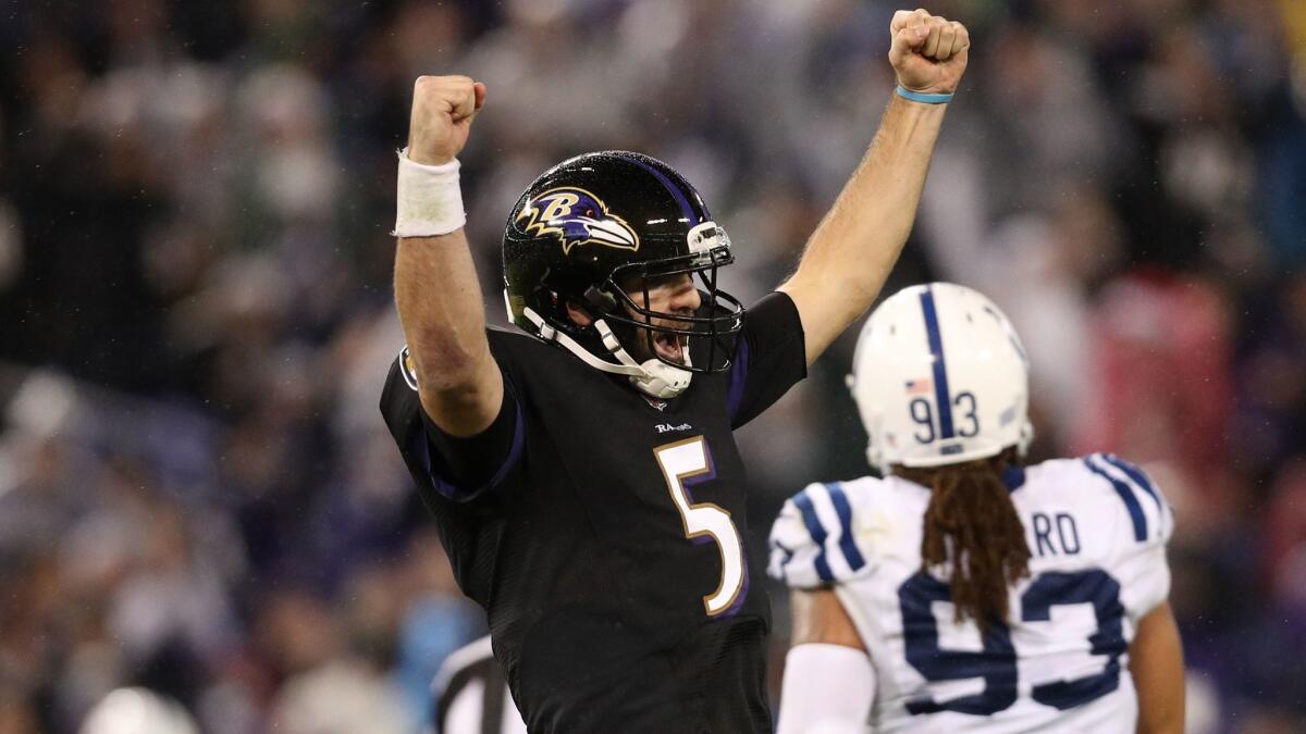 Joe Flacco celebrates after a touchdown in the fourth quarter against the Indianapolis Colts at M&T Bank Stadium in Baltimore.
