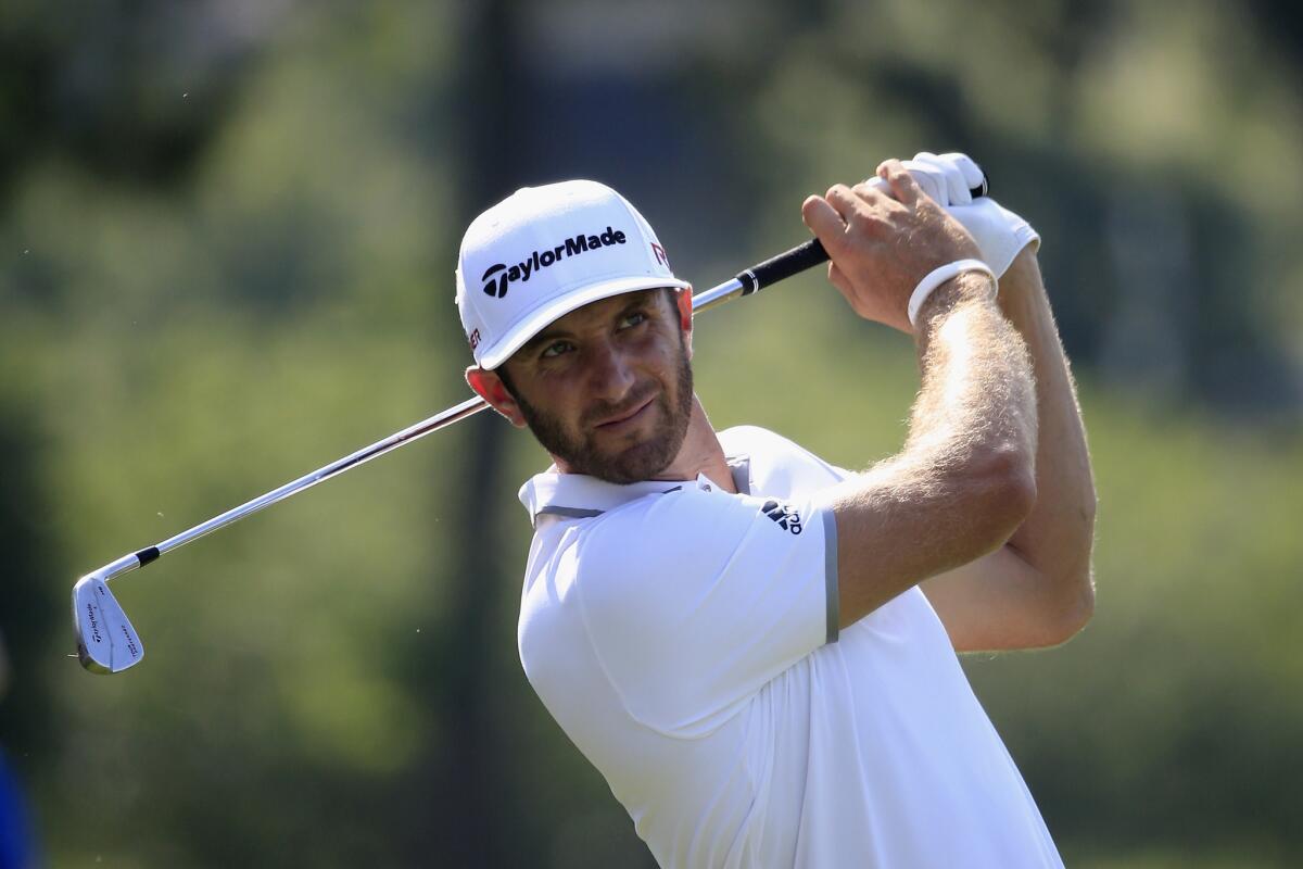 Dustin Johnson tees off during the first round of the FedEx St. Jude Classic at TPC Southwind in Memphis on June 11.
