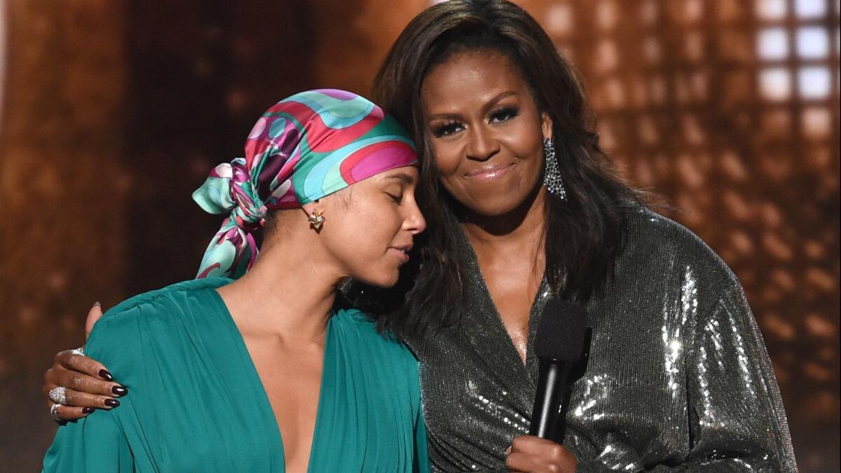 Alicia Keys, left, and Michelle Obama at the 61st Grammy Awards.
