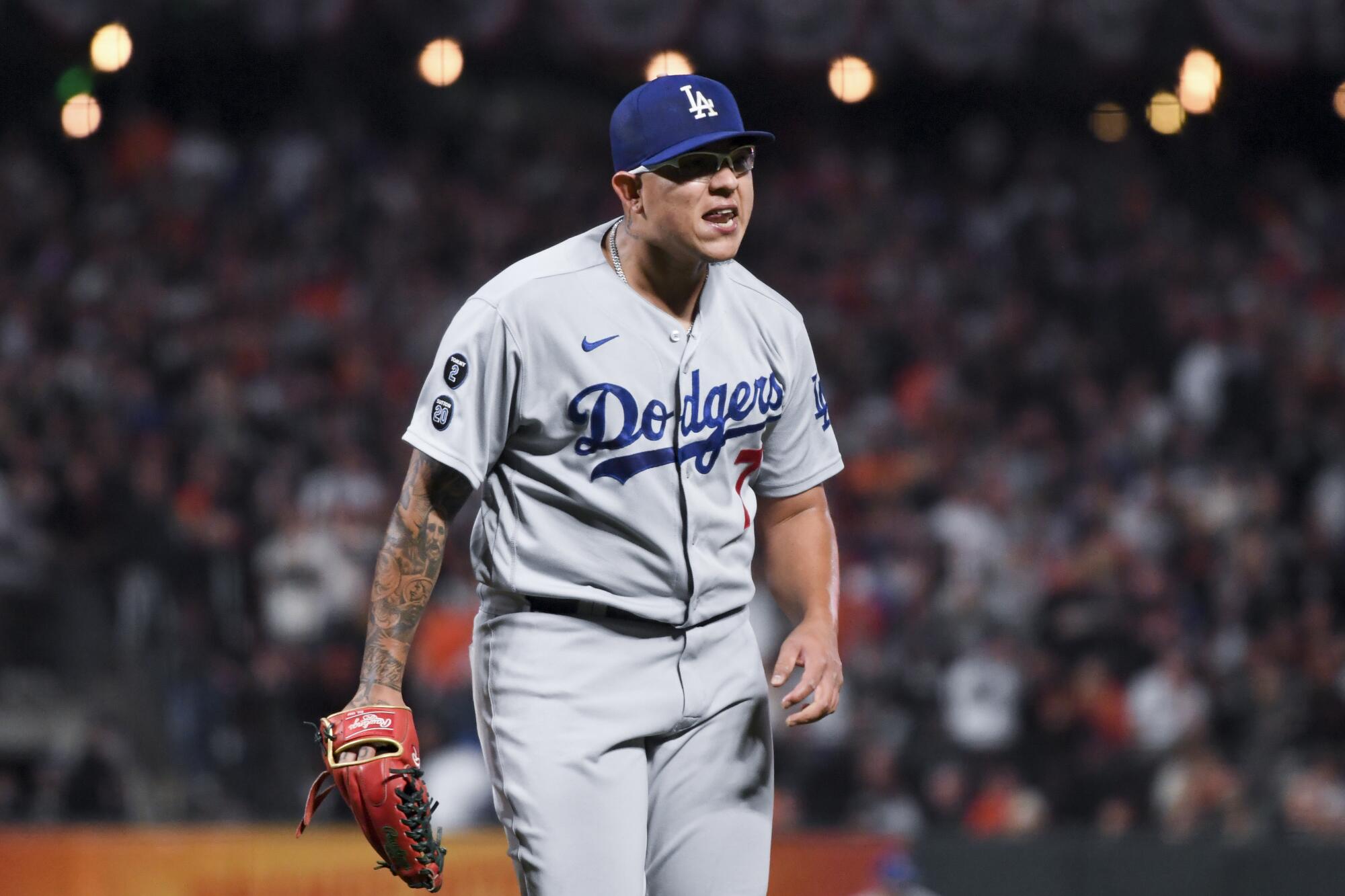 Dodgers pitcher Julio Urias reacts after getting the final out.