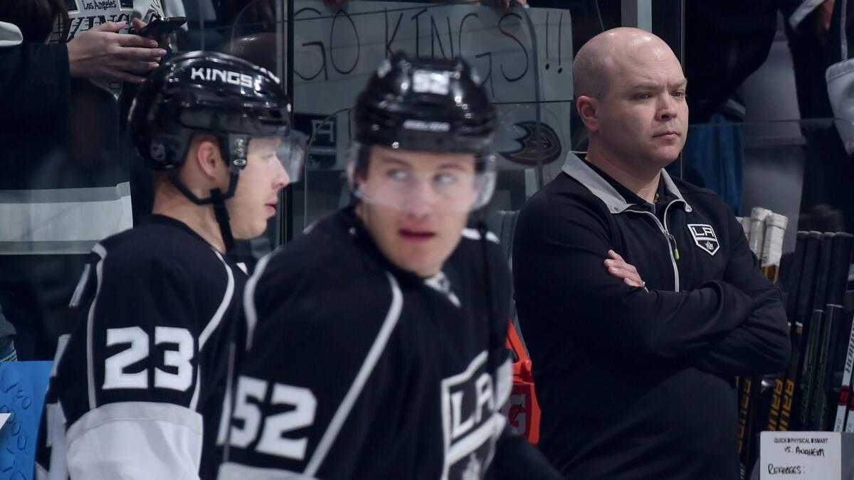 Kings equipment manger Darren Granger (right), looks on during the game between the Kings and Ducks at Staples Center in March 2016.