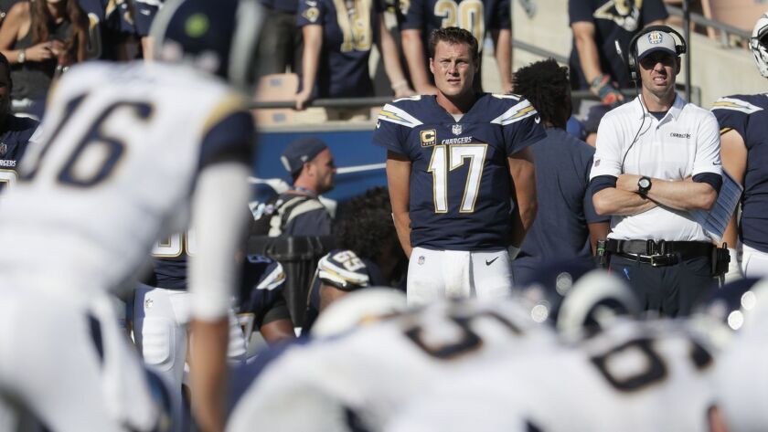 Chargers quarterback Philip Rivers watches Rams quarterback Jared Goff during a game on Sept. 23.