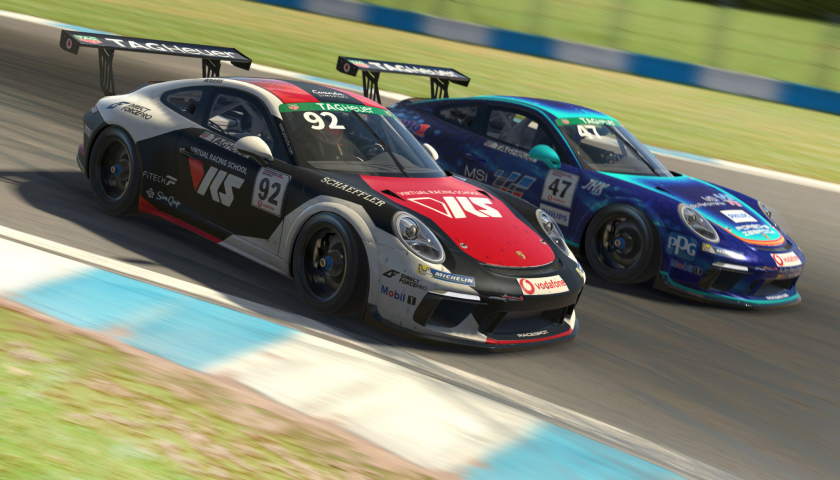 The "Gran Turismo" video game shows two cars racing.