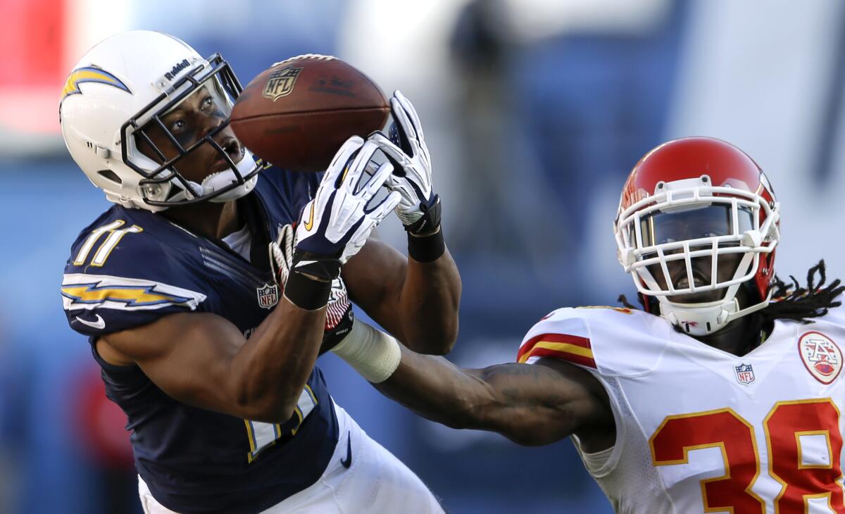 San Diego Chargers receiver Eddie Royal can't hold on to a pass against Kansas City Chiefs defensive back Ron Parker.