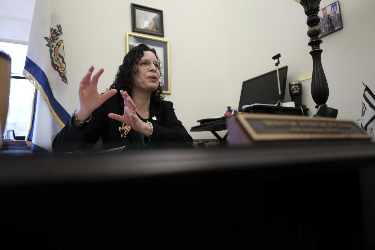 West Virginia state Senator Patricia Rucker talks in her office