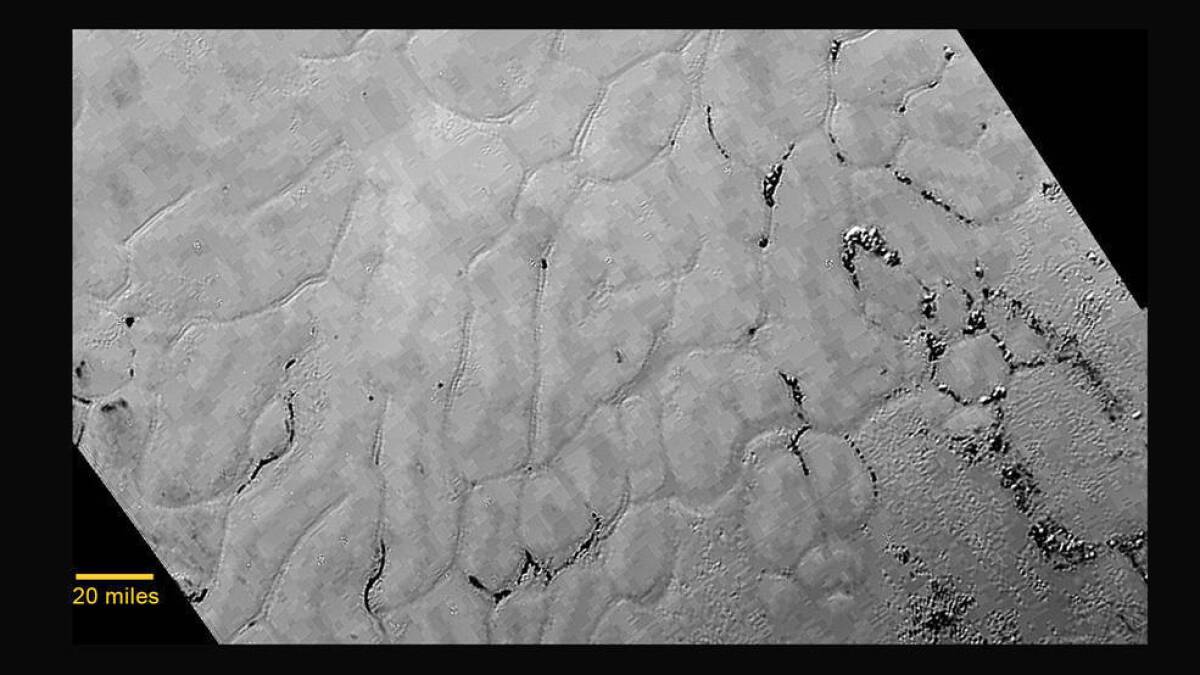 This image of an icy plain on Pluto is notable for its lack of craters. "This could only be a week old, for all we know," one scientist said.