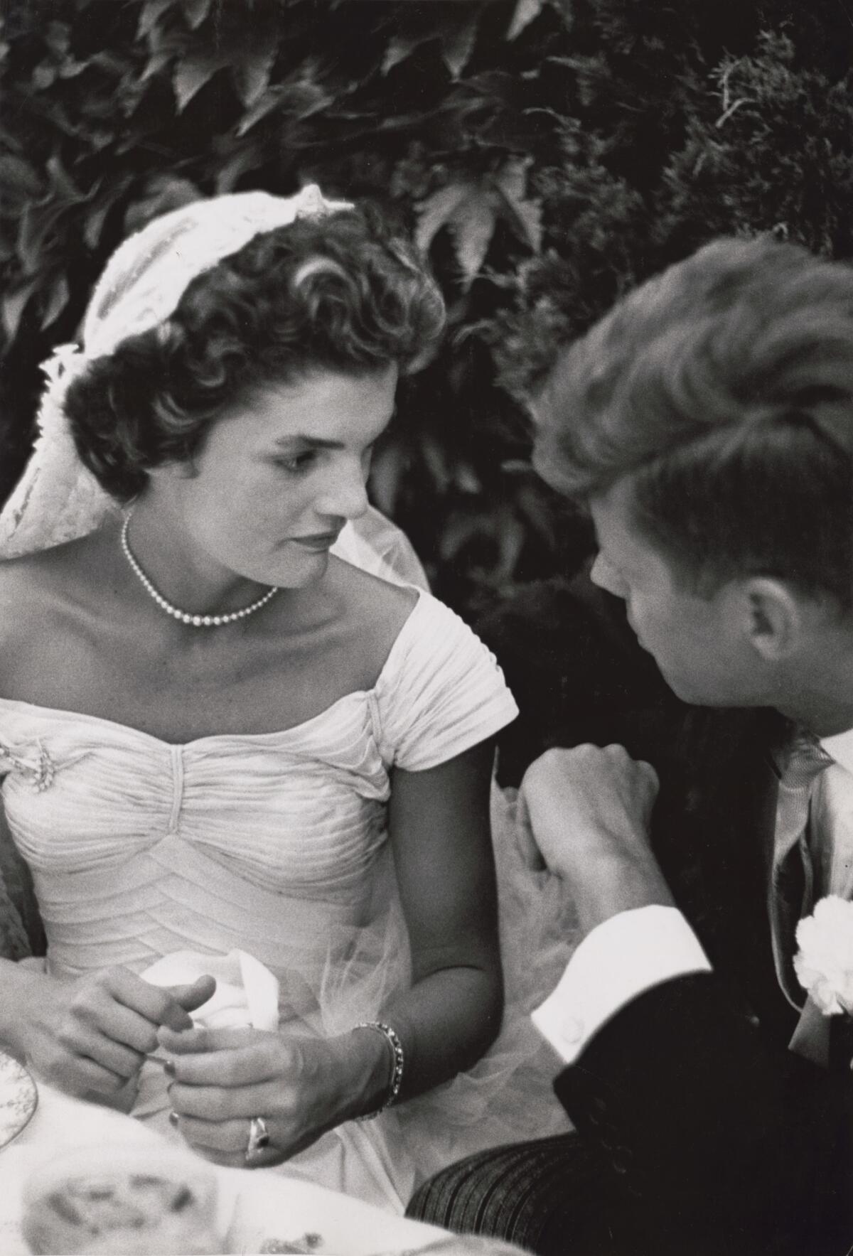 Toni Frissell photograph of Jacqueline Bouvier and John Kennedy on their wedding day, Newport, R.I., 1953.