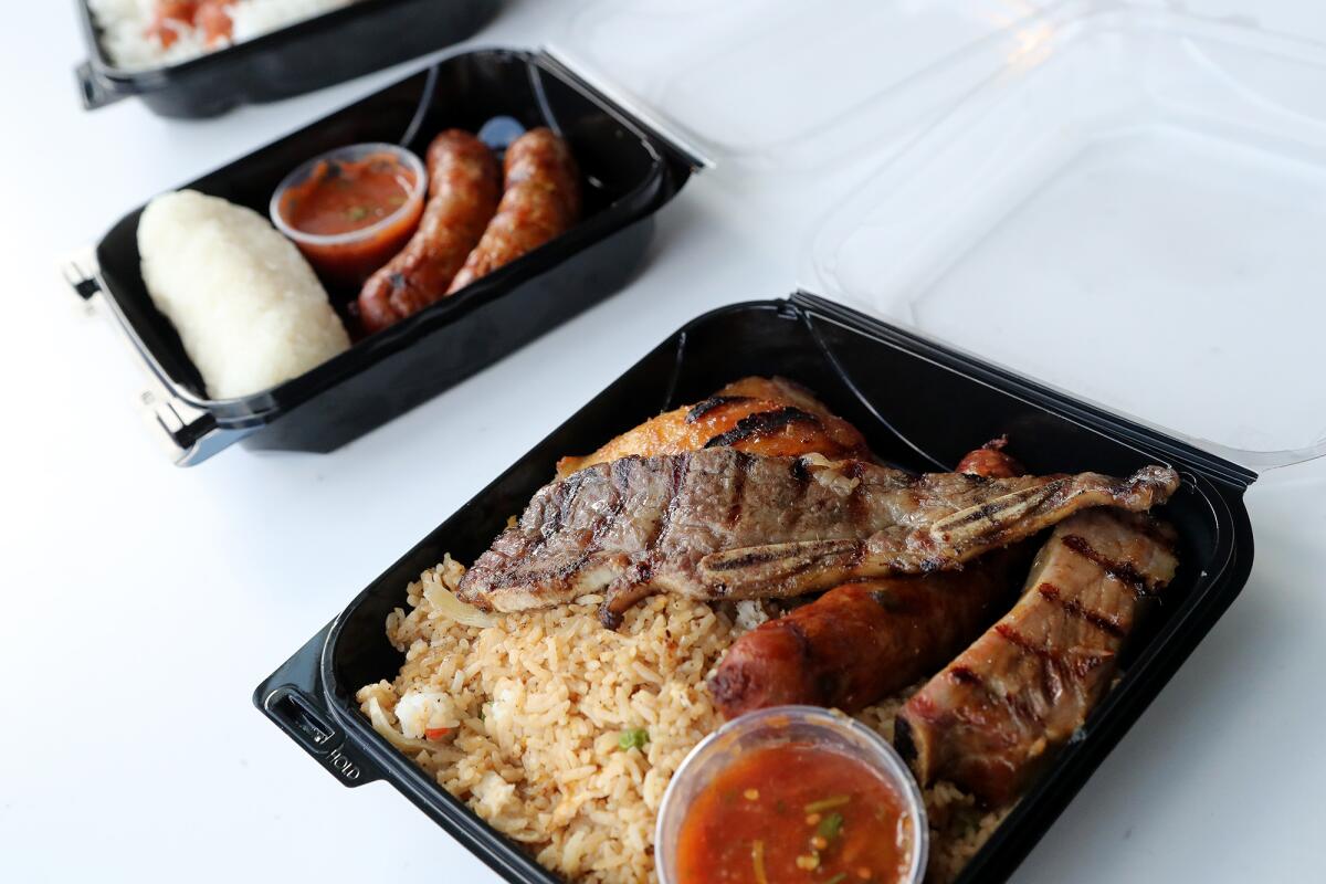 A Lao BBQ mix plate with fried rice, bottom, and a sausage plate, above, by Kra Z Kai's Laotian Barbeque.