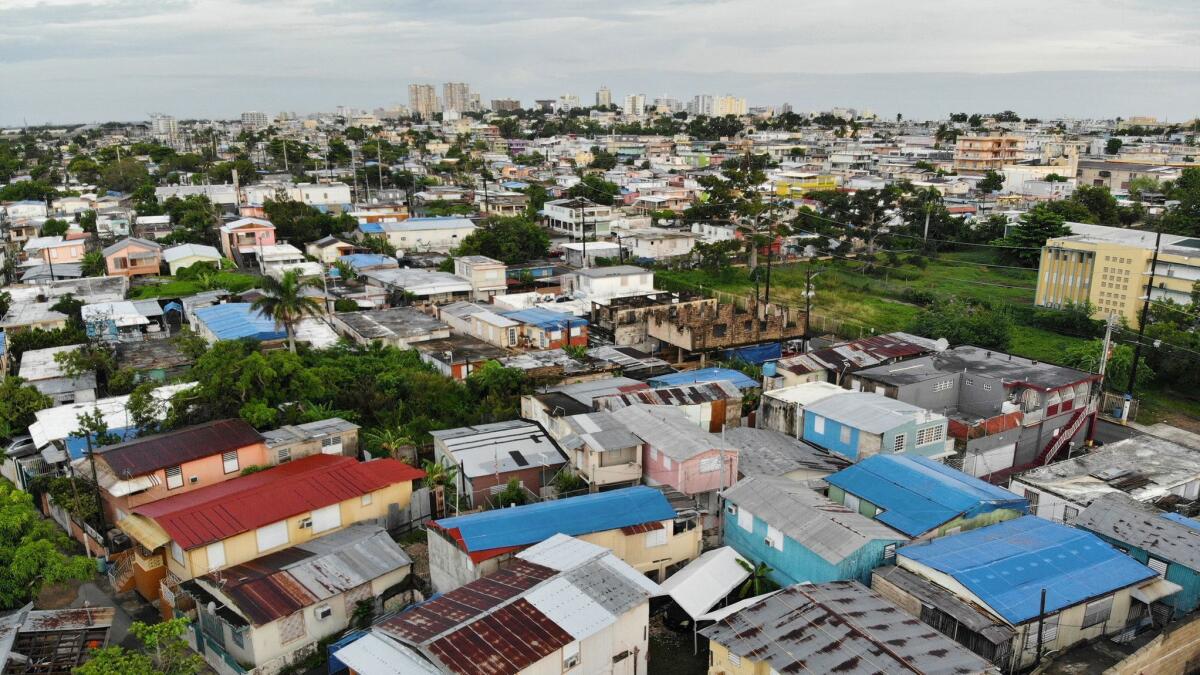 A view of the plastic tarps in the Barrio Obrero area of San Juan, Puerto Rico, where many homes have still not been repaired, on Sept. 13, 2018.