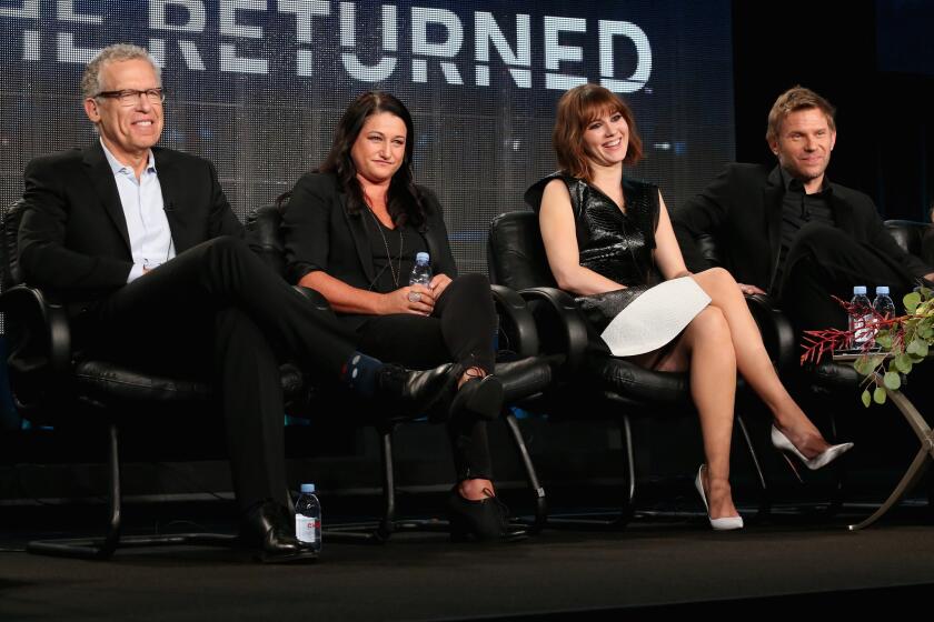 Executive producers Carlton Cuse and Raelle Tucker, actors Mary Elizabeth Winstead and Mark Pellegrino speak onstage during "The Returned" panel at A&E's part of the 2015 Winter Television Critics Assn. press tour Friday in Pasadena.