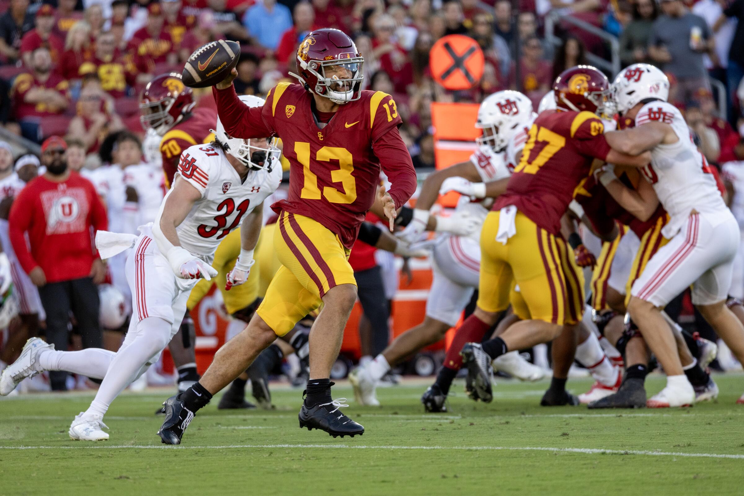 USC quarterback Caleb Williams looks to pass during a loss to Utah at the Coliseum on Oct. 21.