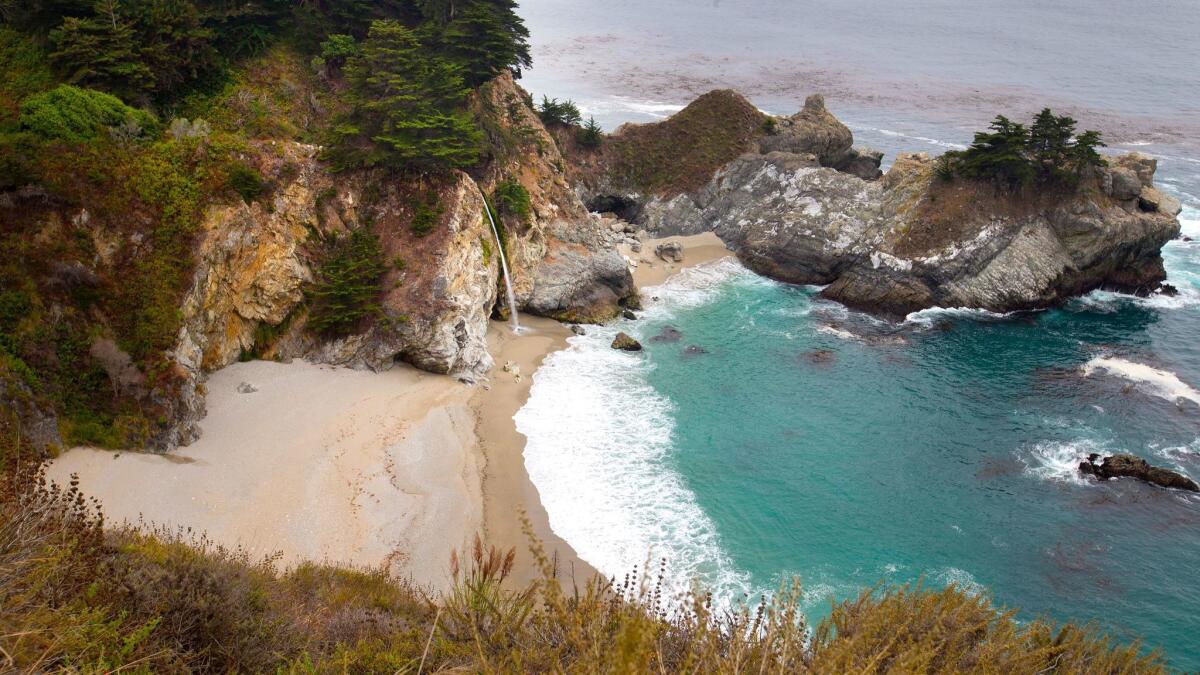 A scenic view of the waterfall at Julia Pfeiffer Burns State Park near Big Sur taken last summer. The park is closed indefinitely, as are others in the area.