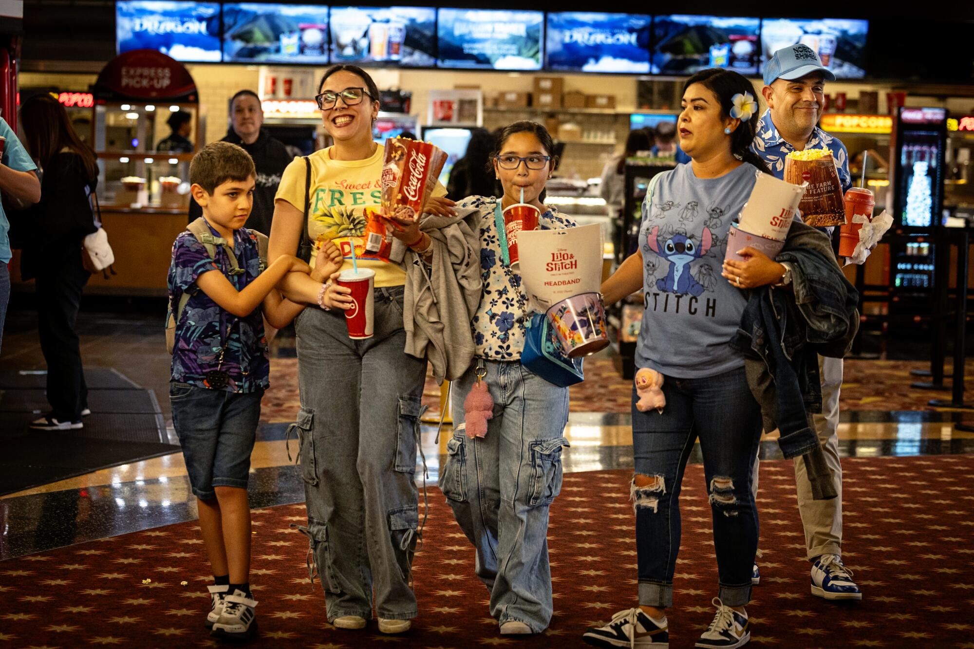 'Lilo & Stitch' beats Tom Cruise and 'Mission: Impossible' in Memorial Day weekend box office 4 Moviegoers attend showings of "Lilo & Stitch" at AMC Century City.