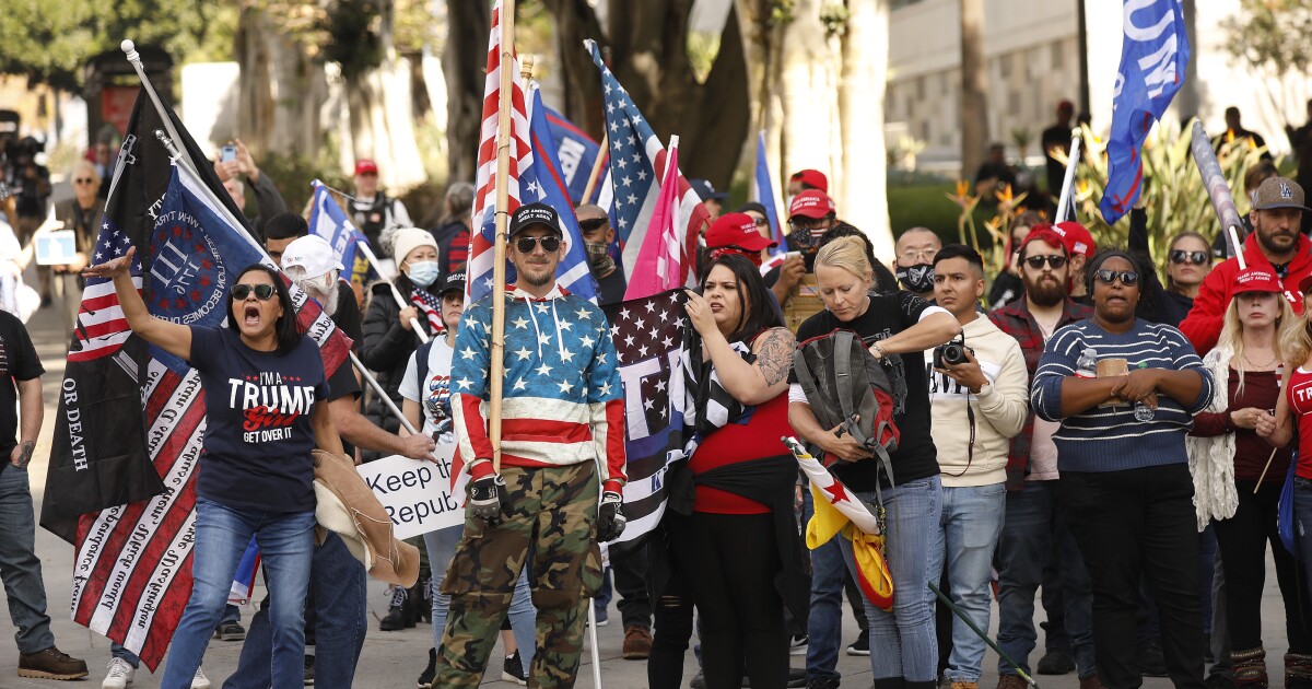 www.latimes.com: Trump supporters clash with counter-protesters and police in L.A. County as deadly violence erupts in Washington www.latimes.com: Trump supporters clash with counter-protesters and police in L.A. County as deadly violence erupts in Washington