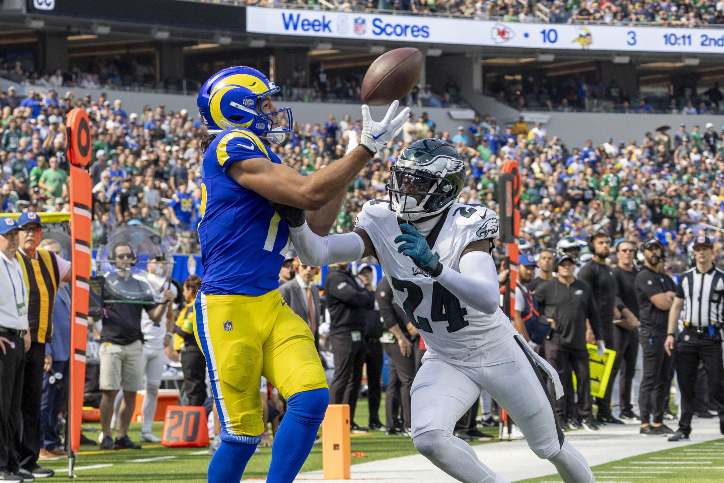 Rams wide receiver Puka Nacua catches a touchdown pass over Philadelphia Eagles cornerback James Bradberry.