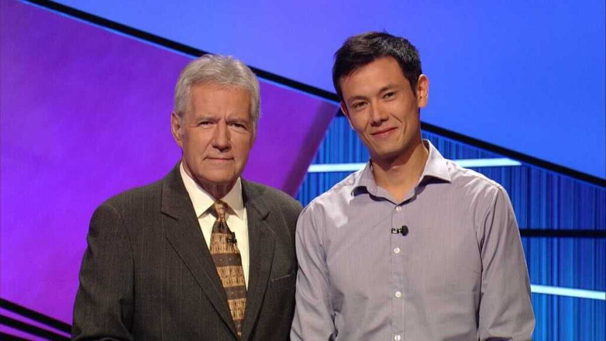 Alex Trebek with "Jeopardy!" contestant Lucas Kwan Peterson in 2012.