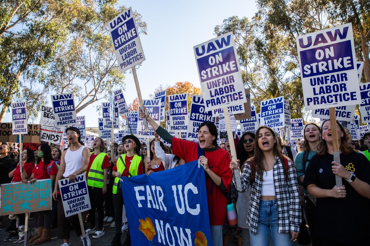 UC San Diego academic workers strike in front of Geisel Library on campus in November. 