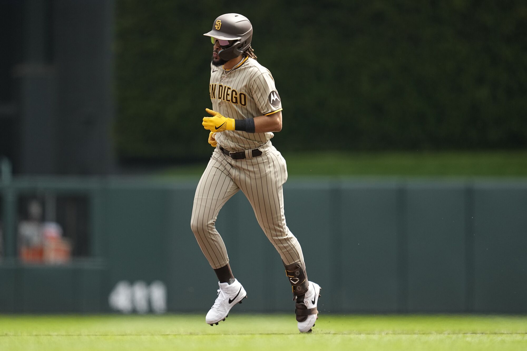 Fernando Tatis Jr. rounds the bases following his first-inning home run.