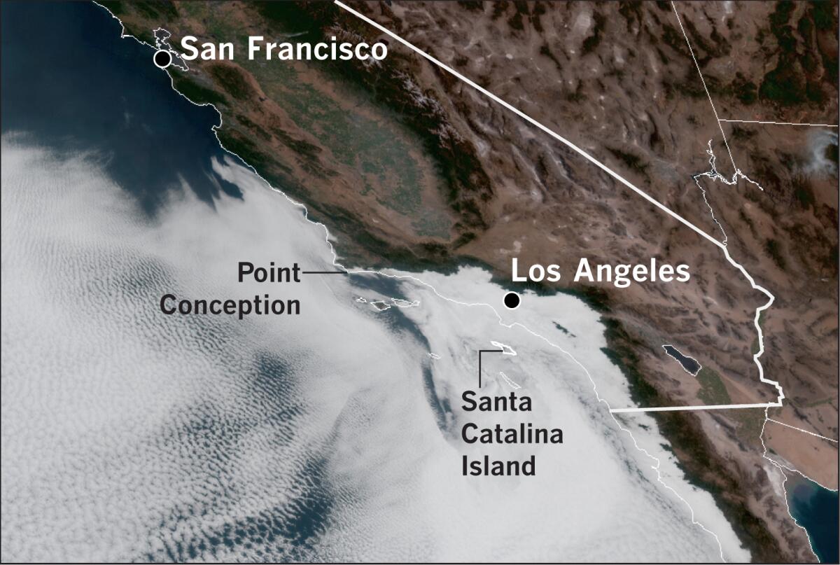 A satellite photo taken at 8:10 a.m. PDT on Thursday shows marine clouds spreading inland from the immediate coast.