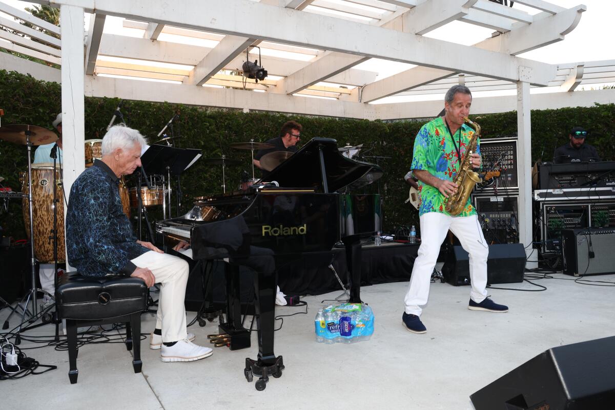 David Benoit and Eric Marienthal perform on stage benefiting the High Hope Head Injury program.