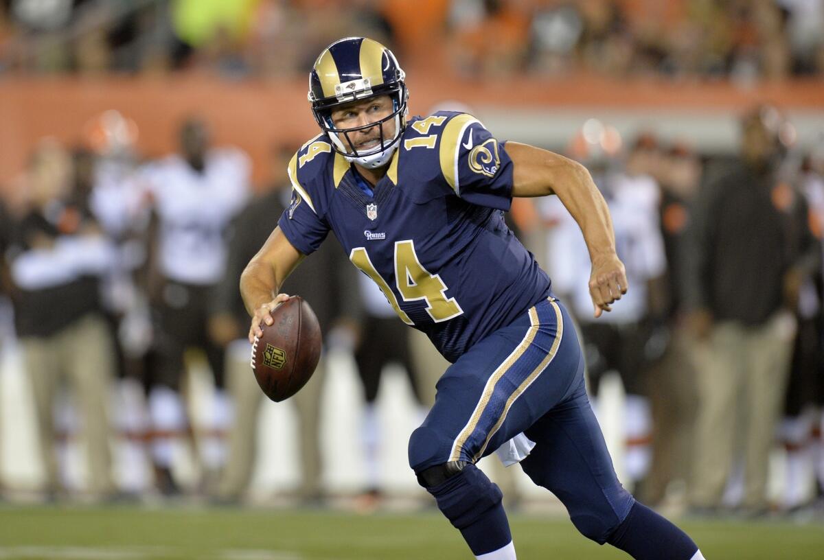 St. Louis Rams quarterback Shaun Hill scrambles away from the Cleveland Browns defense in the second quarter of a preseason game Saturday. Hill completed two of six passing attempts for 45 yards in the 33-14 win over the Browns.