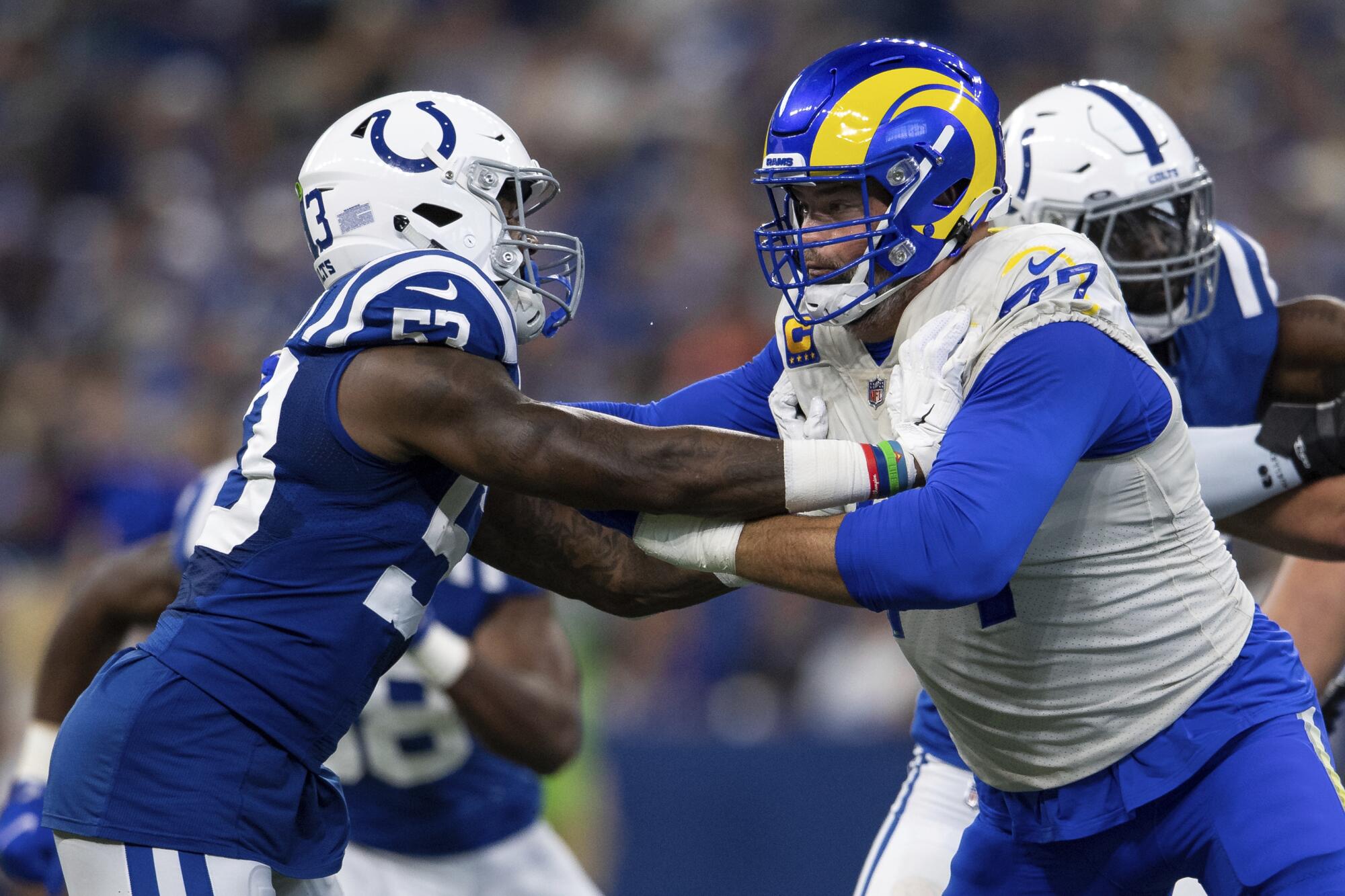 Rams offensive lineman Andrew Whitworth blocks Colts linebacker Darius Leonard.