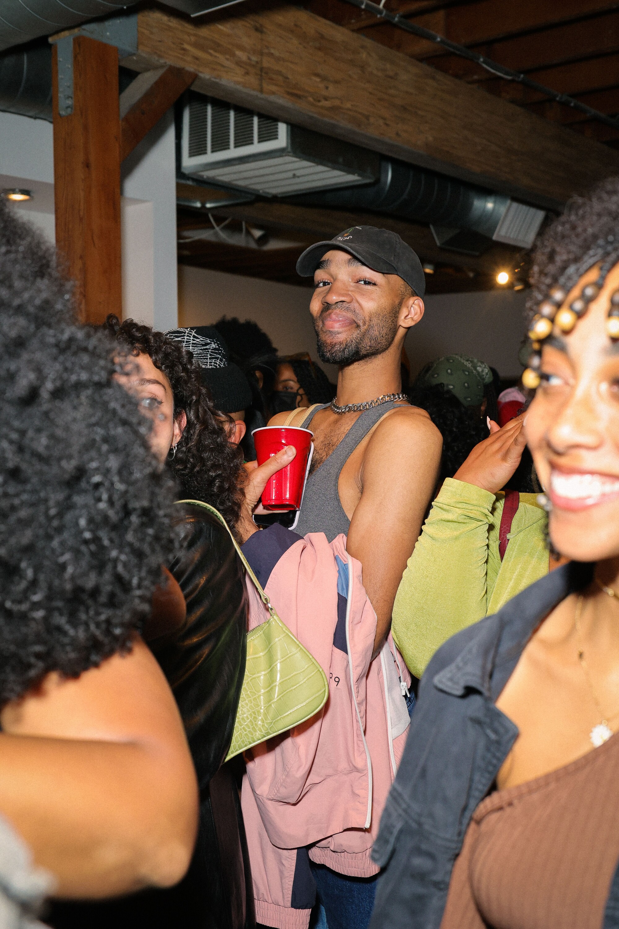 People smile in a crowd