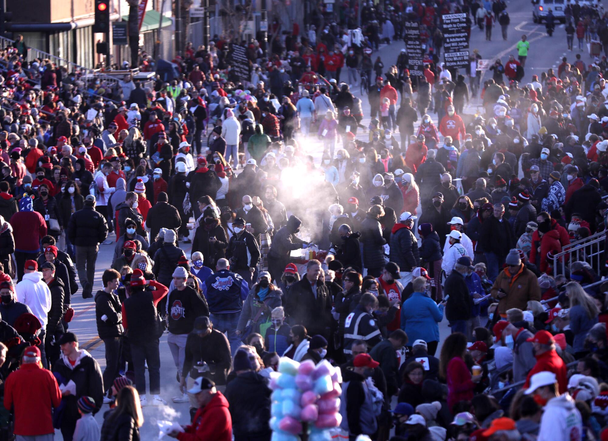 The Rose Parade crowd gathers along Colorado Boulevard