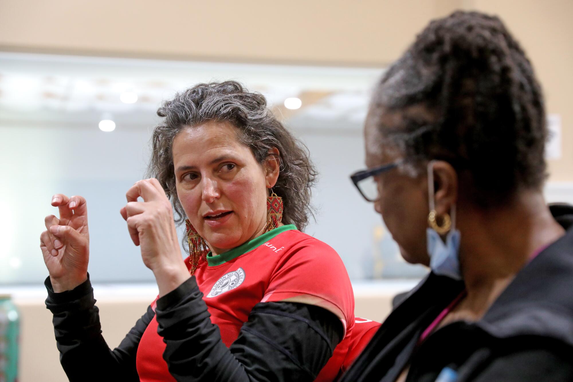 OAKLAND, CA - JUNE 10: Instructor Adriana Camarena, 51, left, of San Francisco, who is a member of the Mexican curling team.