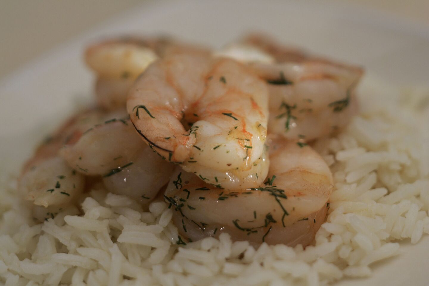 Slow-poached shrimp is tender and flavorful.