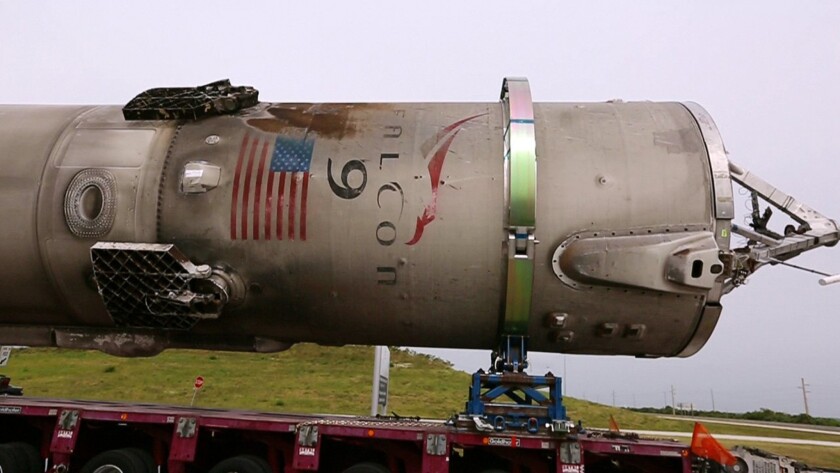 SpaceX moves the first stage of a Falcon 9 rocket from Port Canaveral on June 6.