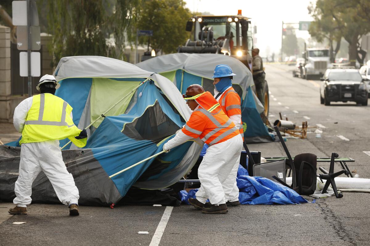 A federal judge has found that L.A. city officials doctored records in a case over homeless camp cleanups