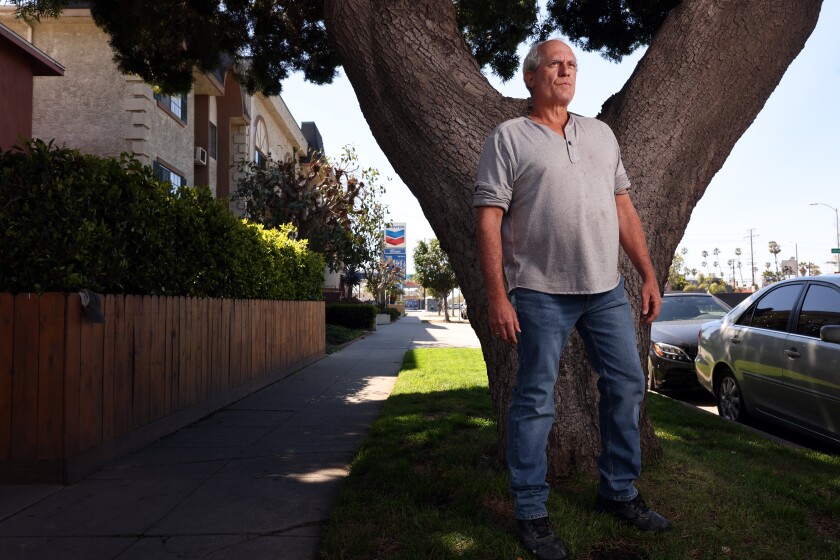 John Leddy stands near his home in Venice.