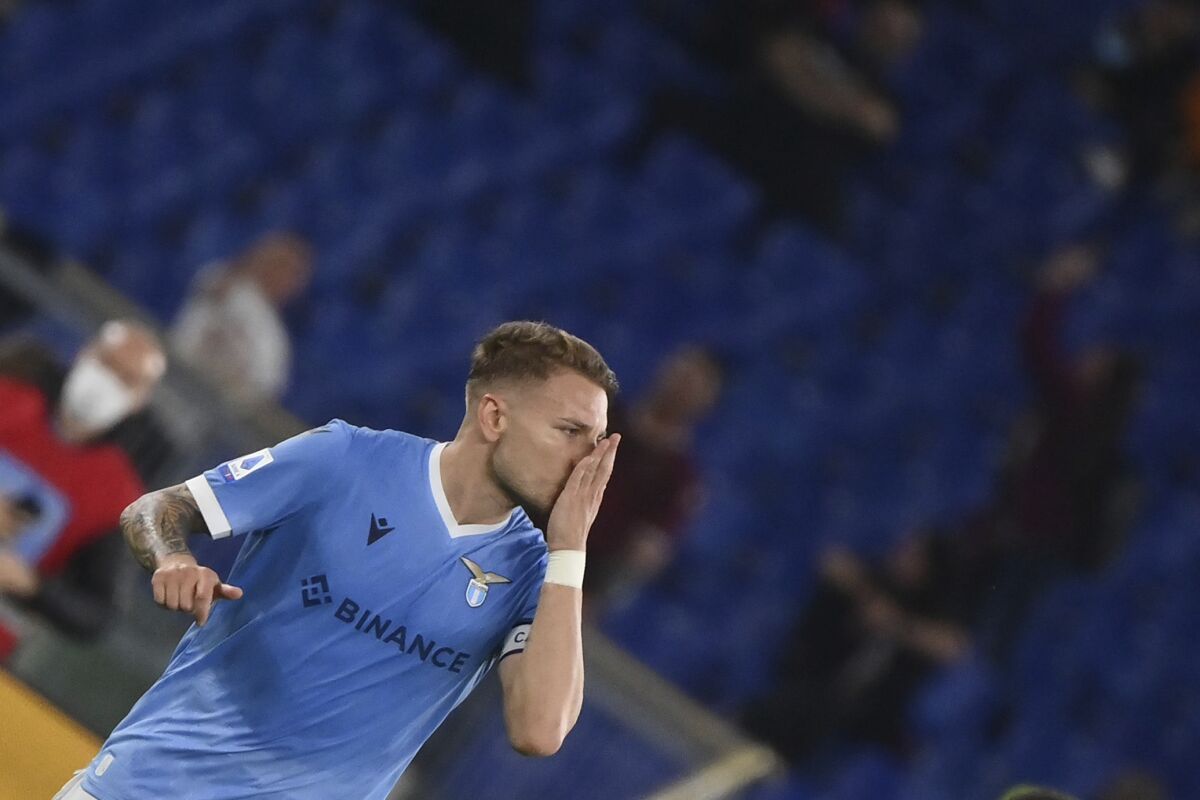 Lazio's Ciro Immobile celebrates after scoring his side's first goal during the Italian Serie A soccer match between Lazio and Salernitana at the Olympic stadium in Rome, Sunday, Nov. 7 2021. (Alfredo Falcone/LaPresse via AP)