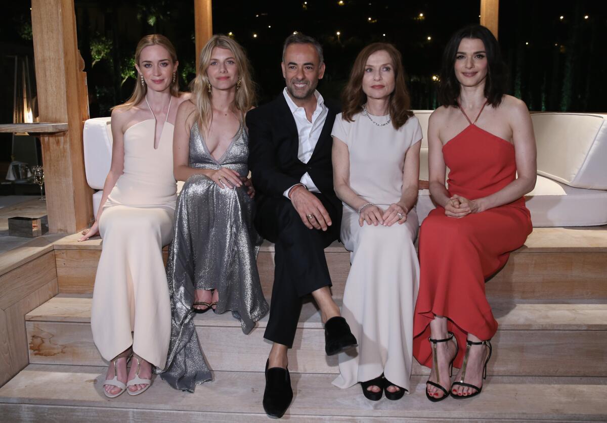 Emily Blunt, left, Melanie Laurent, Women's Creative Director of Calvin Klein Collection Francisco Costa, Isabelle Huppert and Rachel Weisz at the Women in Film party at the 68th Cannes Film Festival.