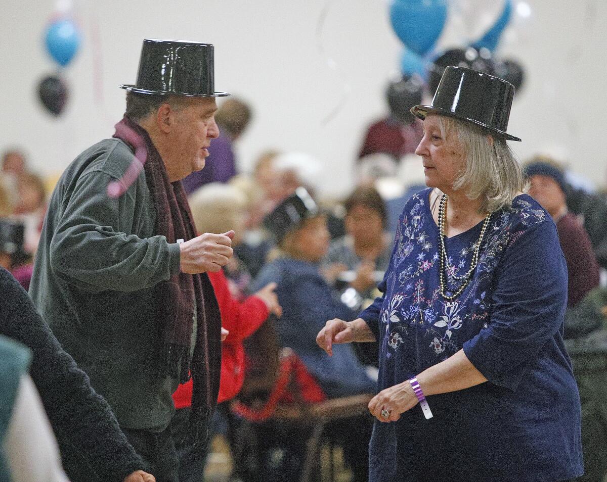 Michael and Arlene Simpson of Burbank enjoy a dance at the Joslyn Center in Burbank in January 2019. Due to current stay-at-home orders from health officials during the coronavirus pandemic, city Parks and Recreation officials are putting final touches on the Project Hope program, in which volunteers assist homebound seniors.