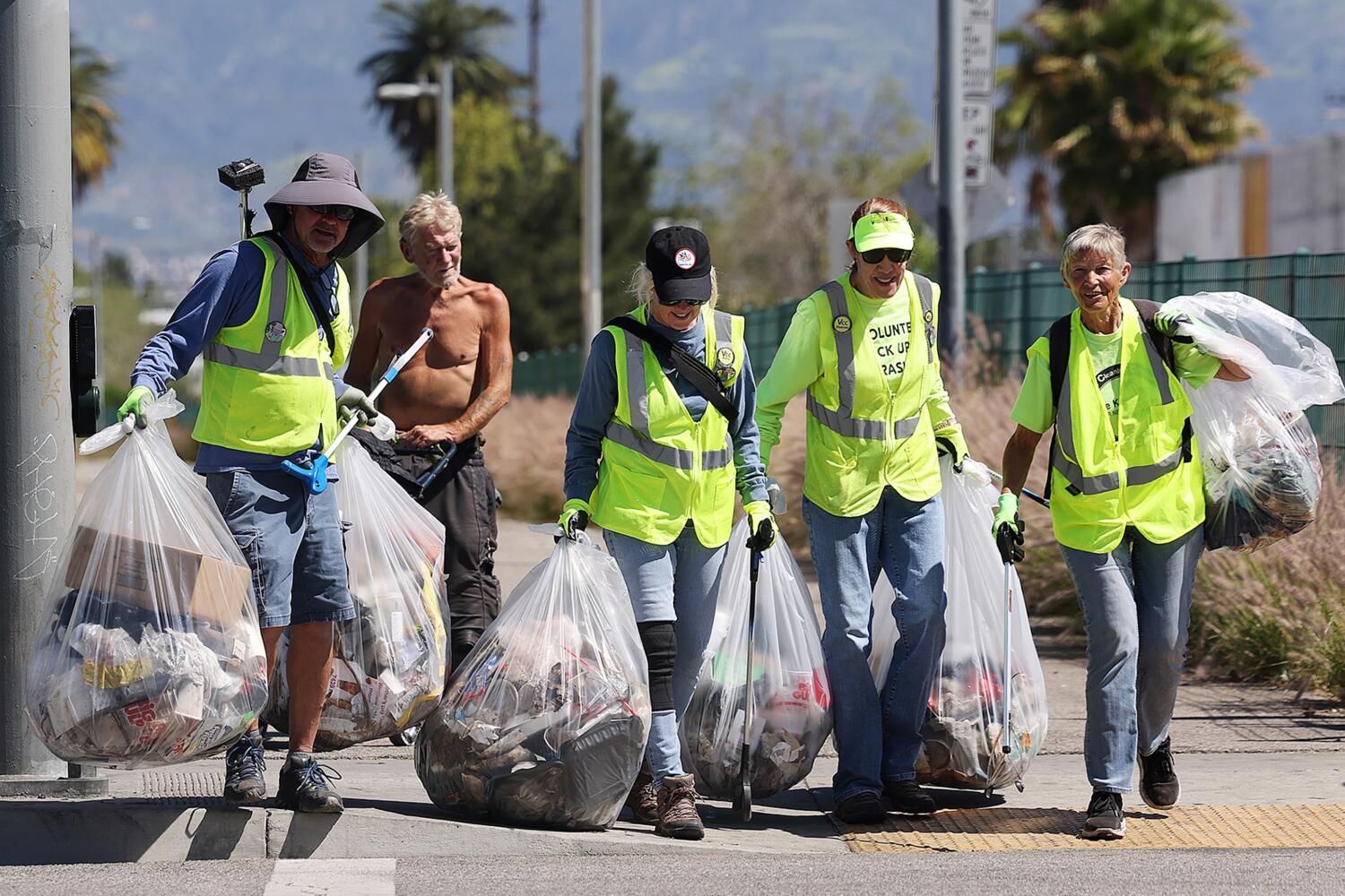 Volunteers Cleaning Communities, VCC, pick up trash in Canoga Park on Wednesday, May 14, 2025.